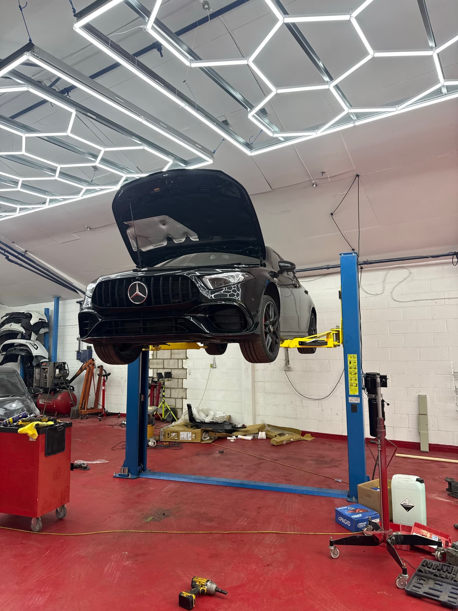 Mercedes-AMG raised on the workshop lift